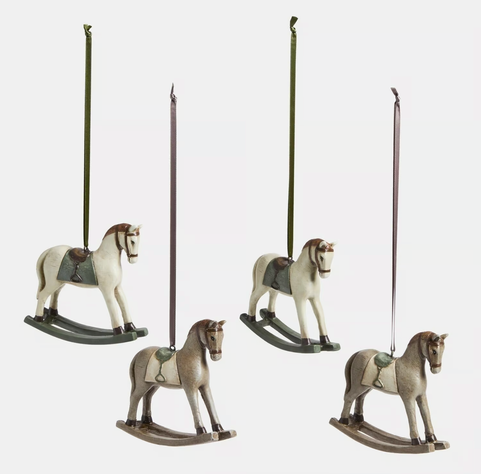 Four Cory rocking horse ornaments