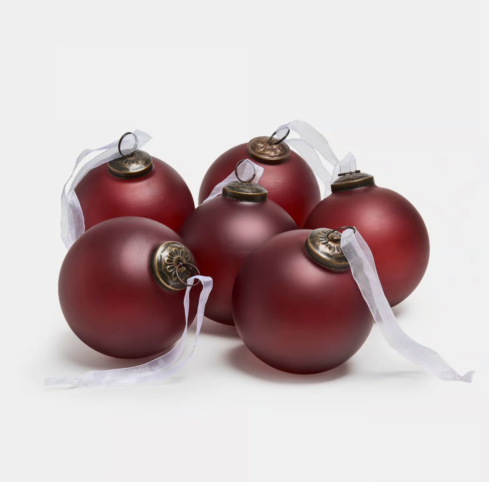 Six burgundy Sephore Christmas baubles